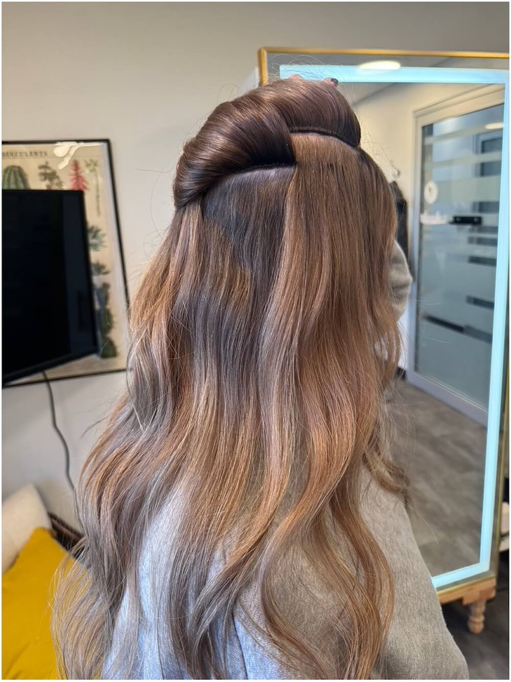 Woman with IBE hair extensions installed by Seattle hair stylist Carrie Albertus